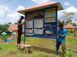 PEMASANGAN PAPAN APBDESA DI TK NEGERI PATUK 